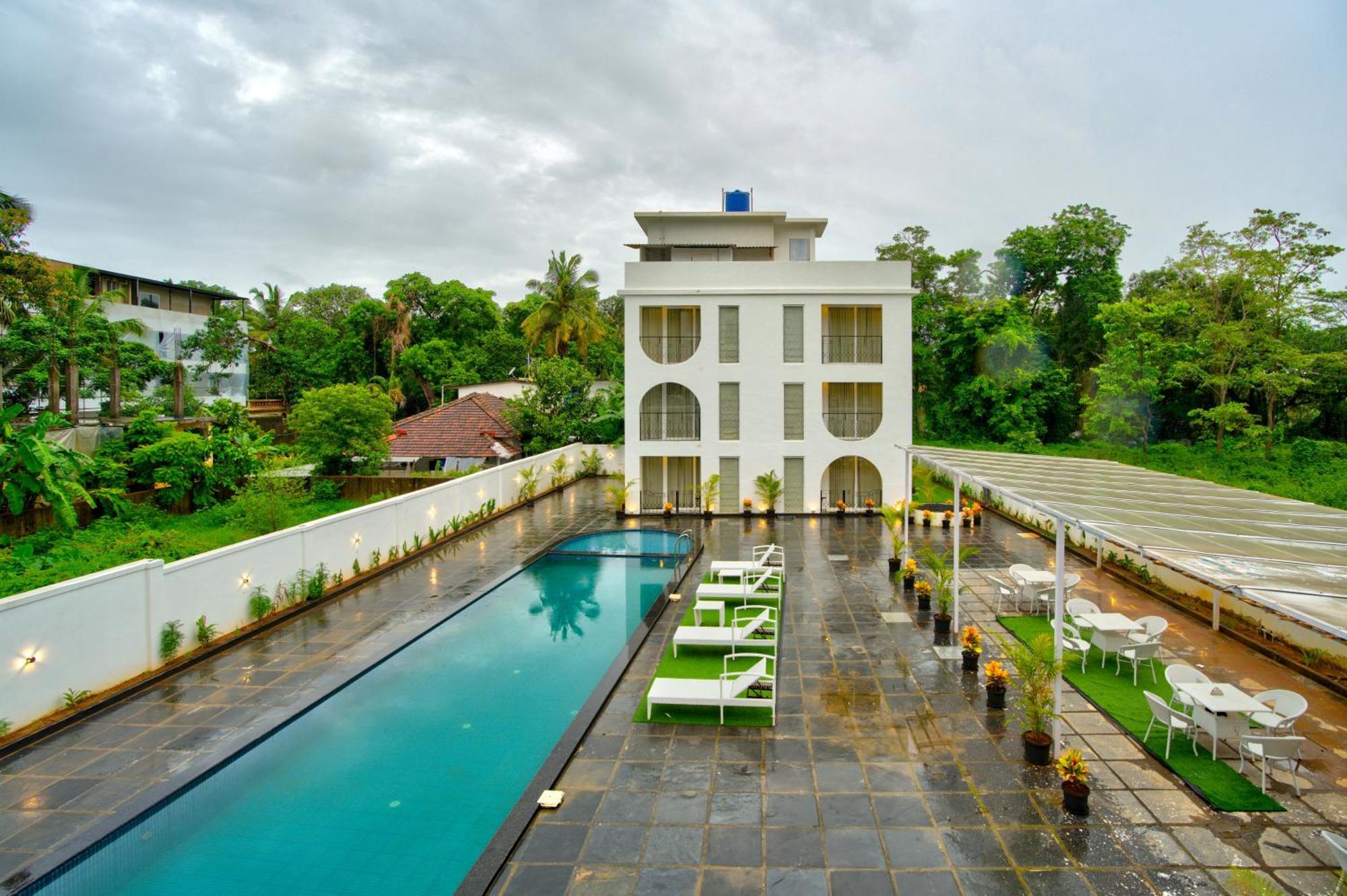 Goa Courtyard By The Porto Arpora Hotel Baga Kültér fotó