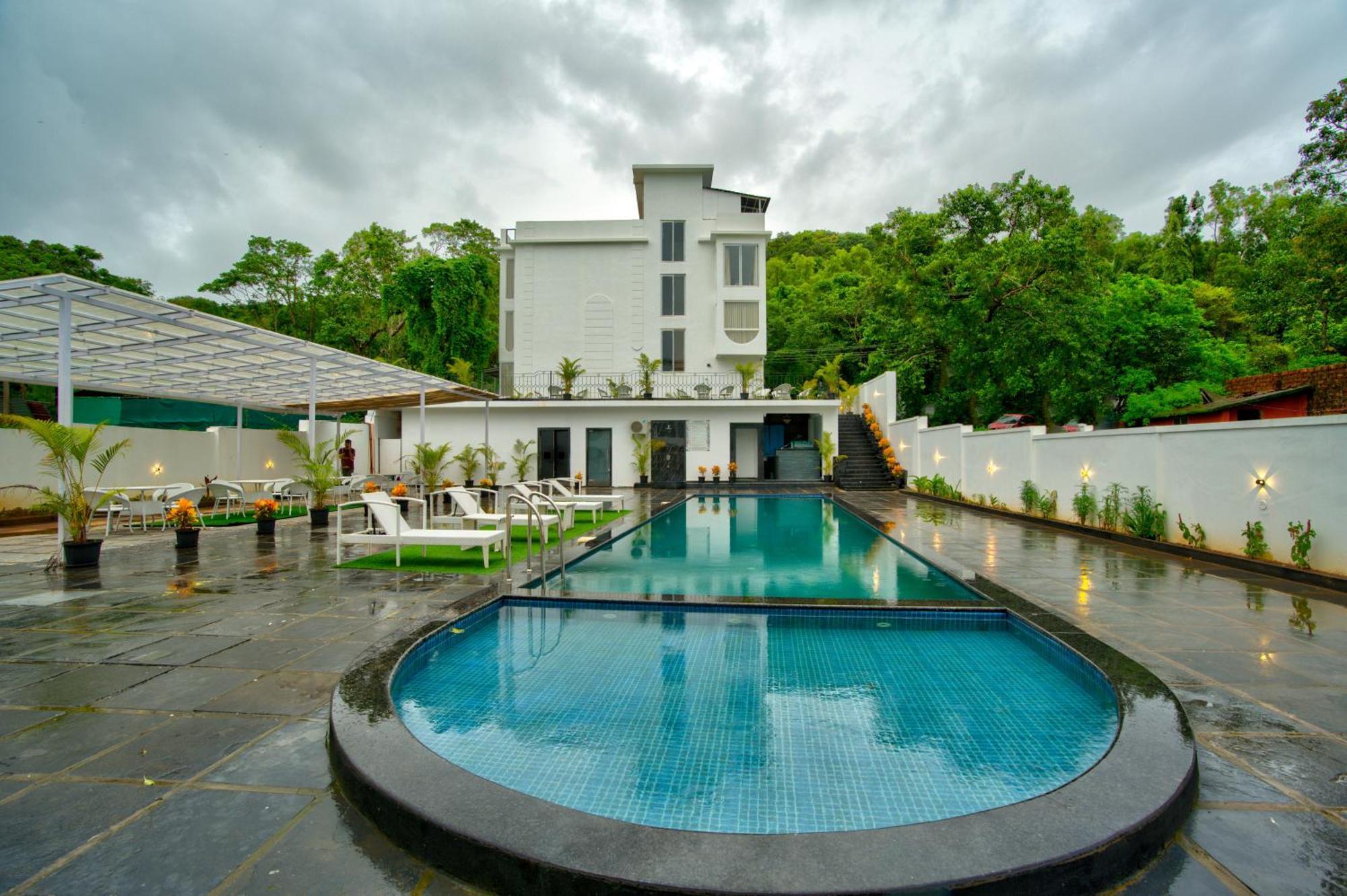 Goa Courtyard By The Porto Arpora Hotel Baga Kültér fotó