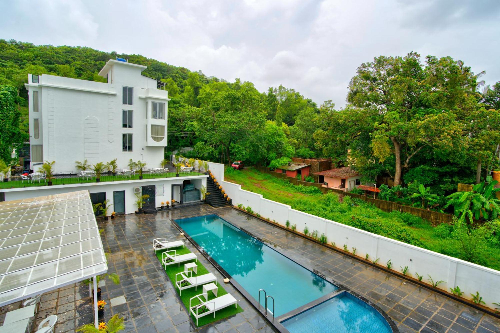 Goa Courtyard By The Porto Arpora Hotel Baga Kültér fotó