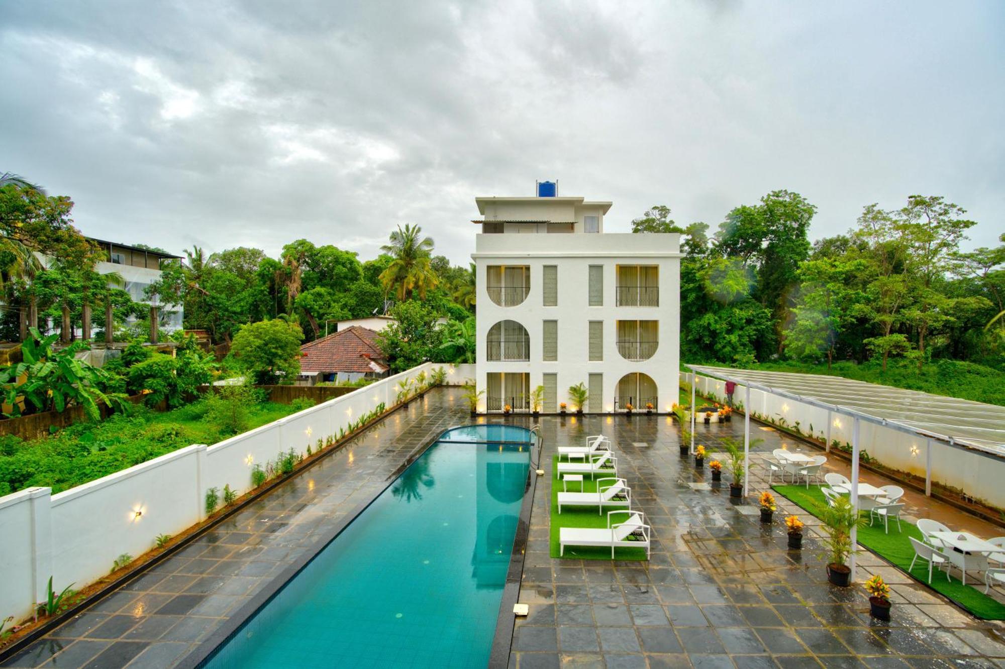 Goa Courtyard By The Porto Arpora Hotel Baga Kültér fotó