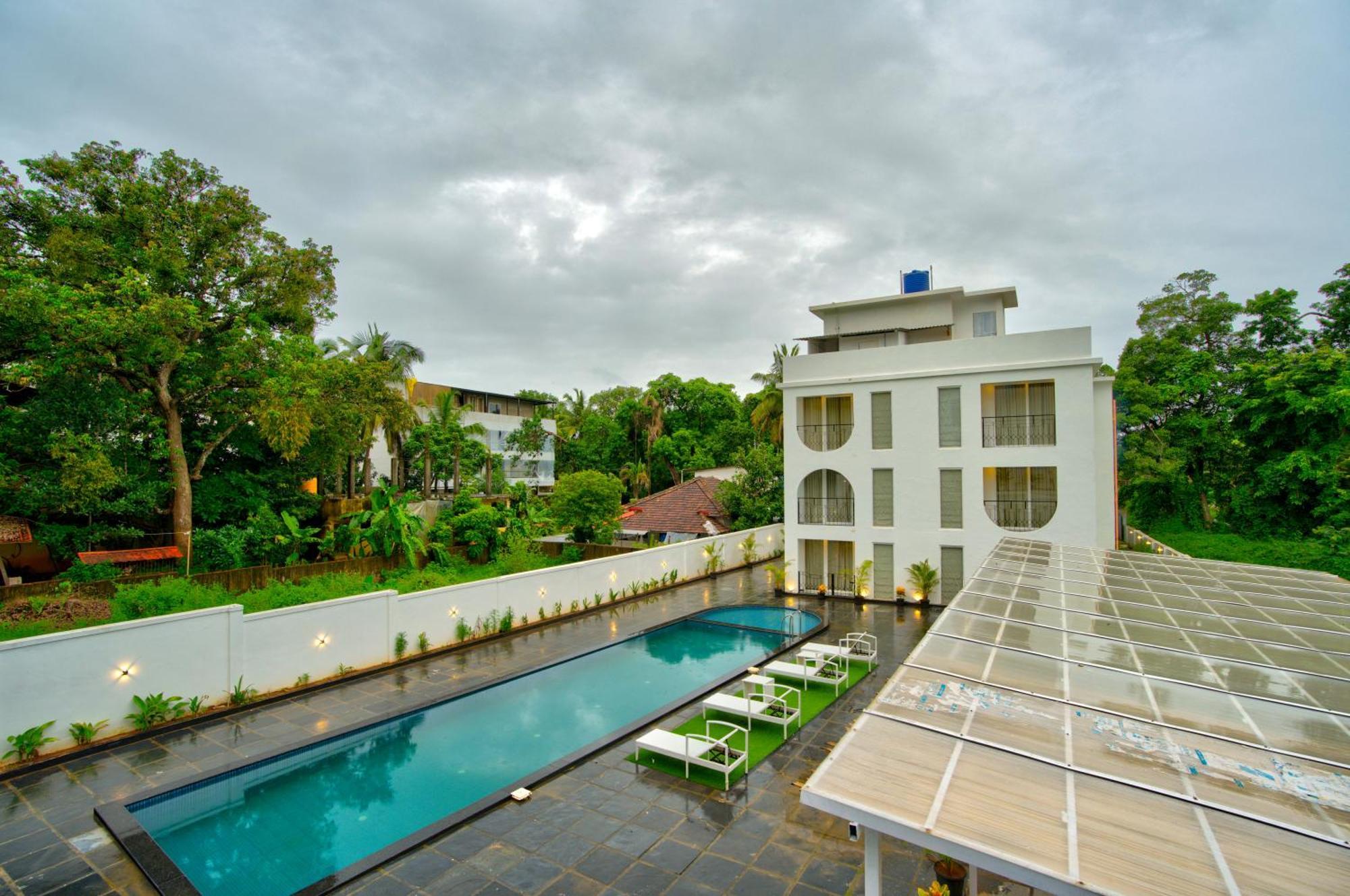 Goa Courtyard By The Porto Arpora Hotel Baga Kültér fotó