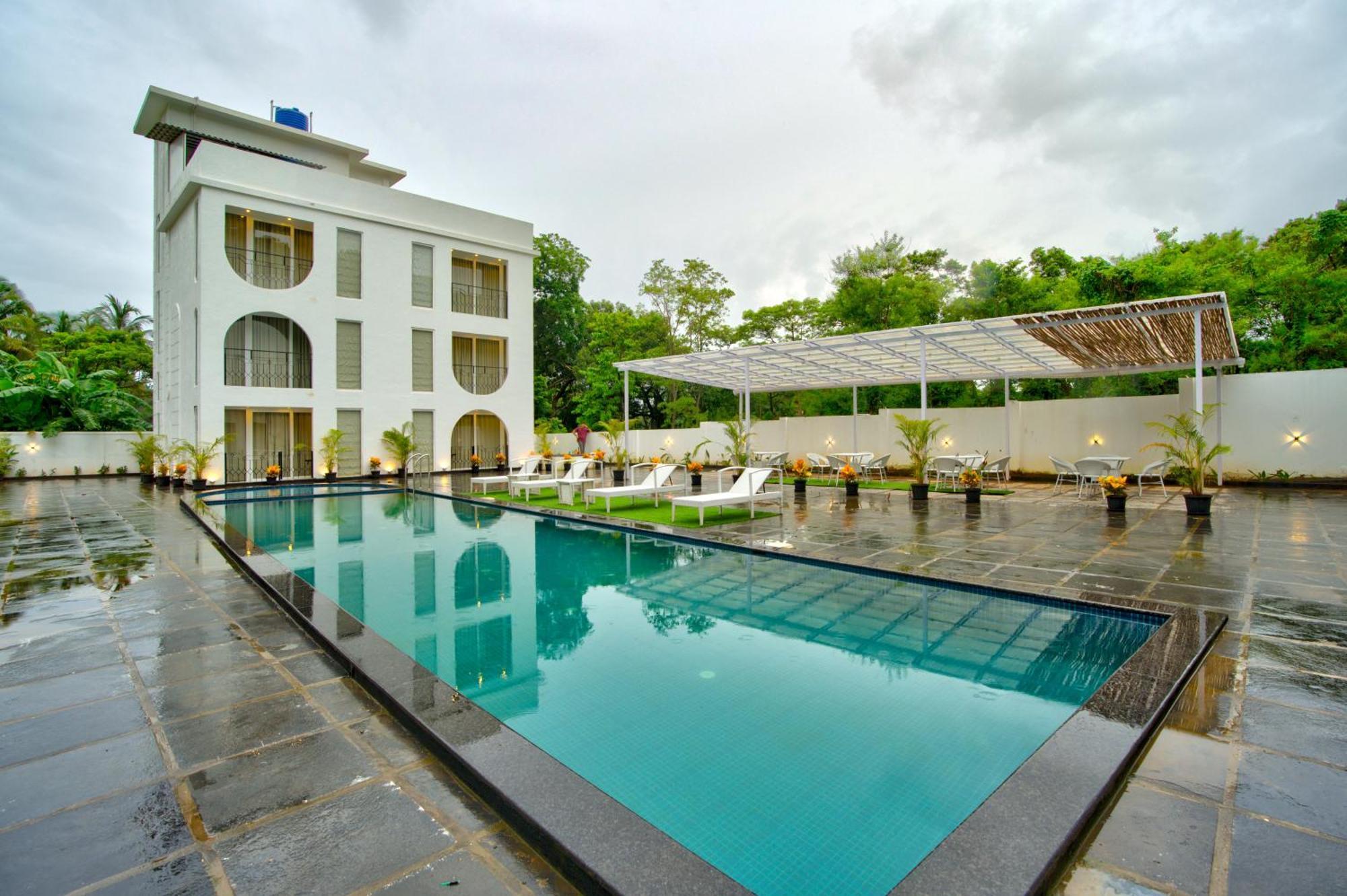 Goa Courtyard By The Porto Arpora Hotel Baga Kültér fotó