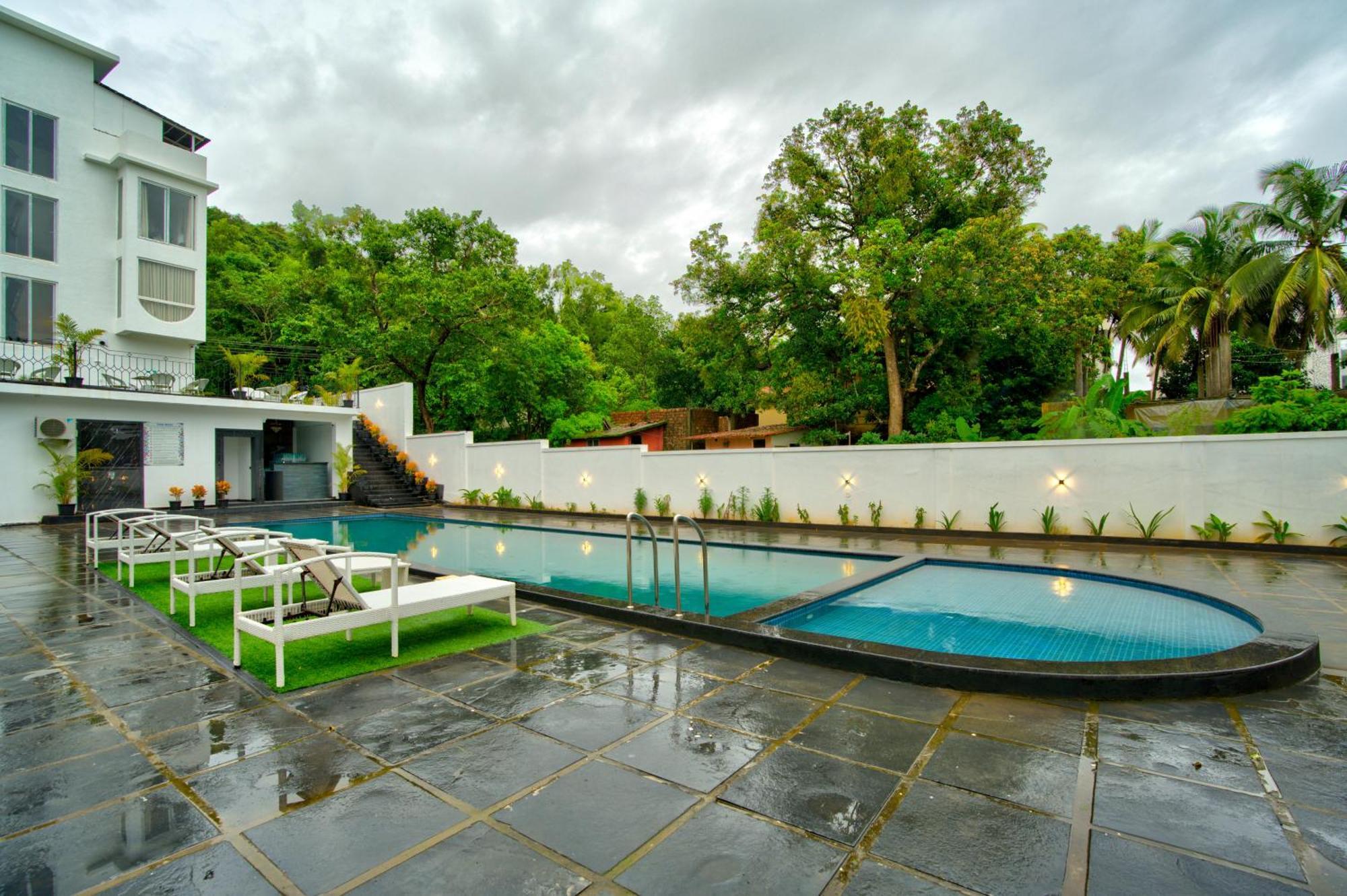 Goa Courtyard By The Porto Arpora Hotel Baga Kültér fotó