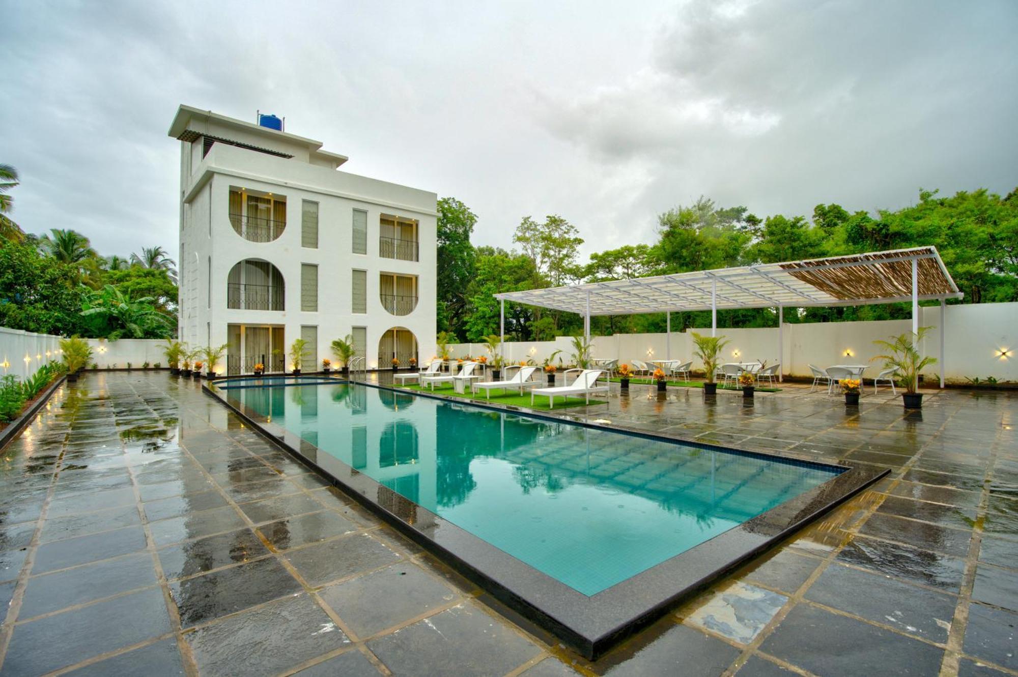 Goa Courtyard By The Porto Arpora Hotel Baga Kültér fotó
