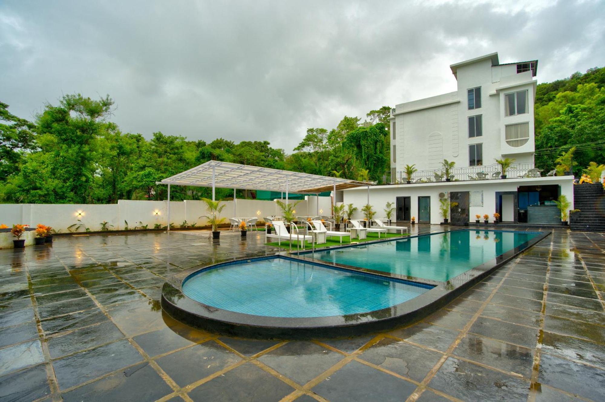Goa Courtyard By The Porto Arpora Hotel Baga Kültér fotó